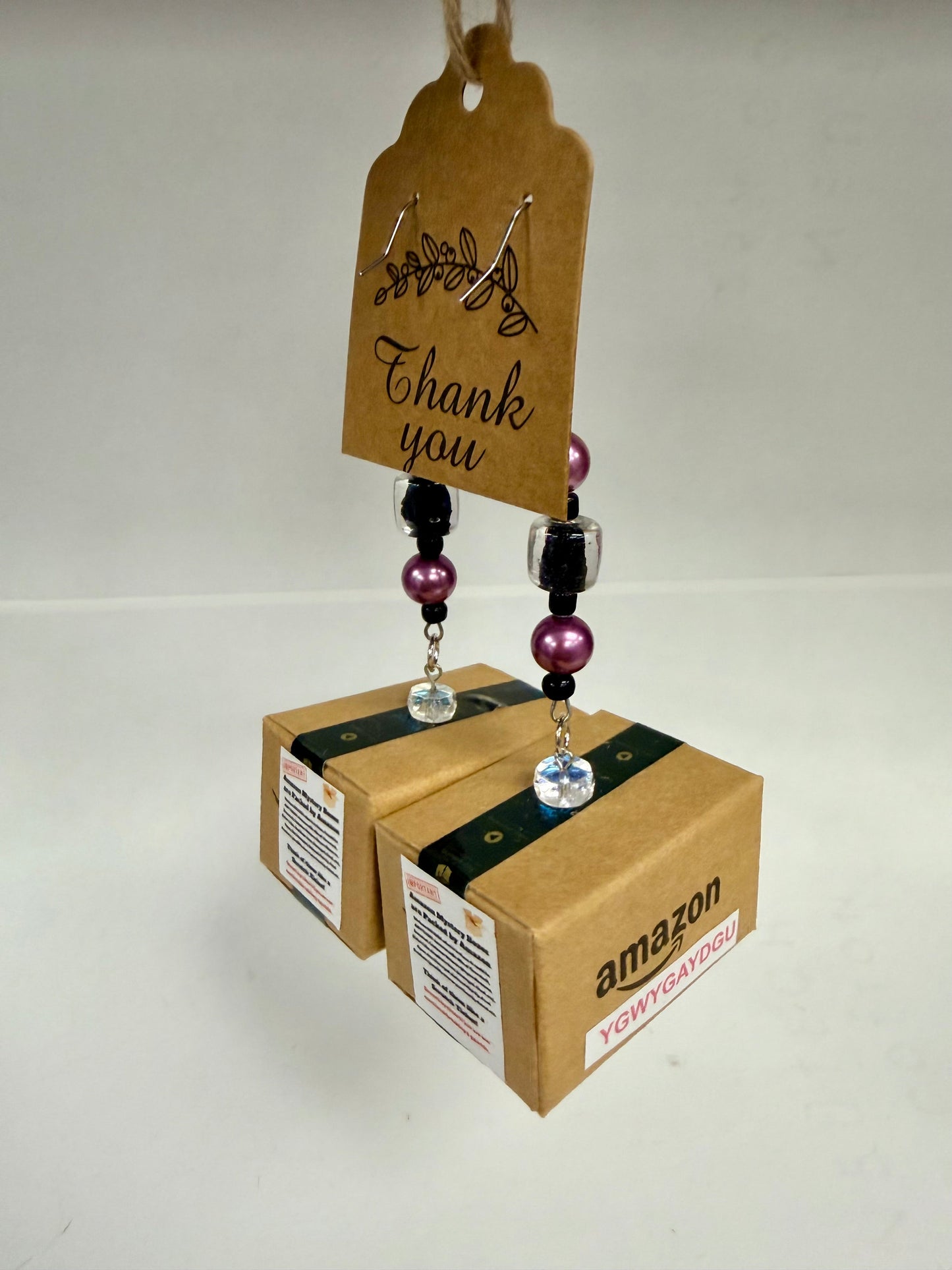 Wearable blind box earrings modeled