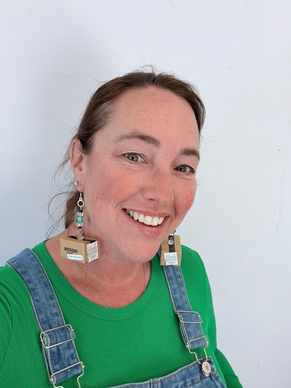 Handcrafted mystery box earrings pair display