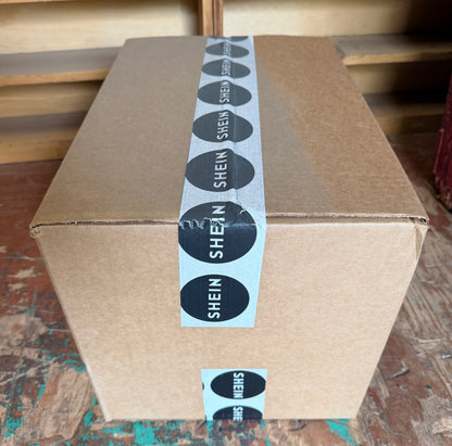 Sealed Shein mystery box packed with assorted surprise merchandise