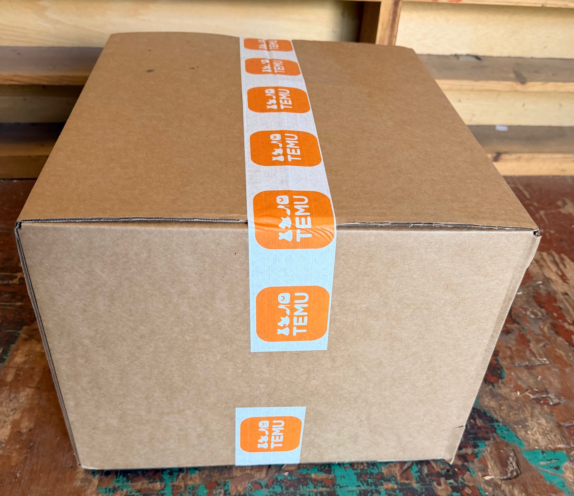 Sealed Temu mystery box packed with assorted surprise merchandise